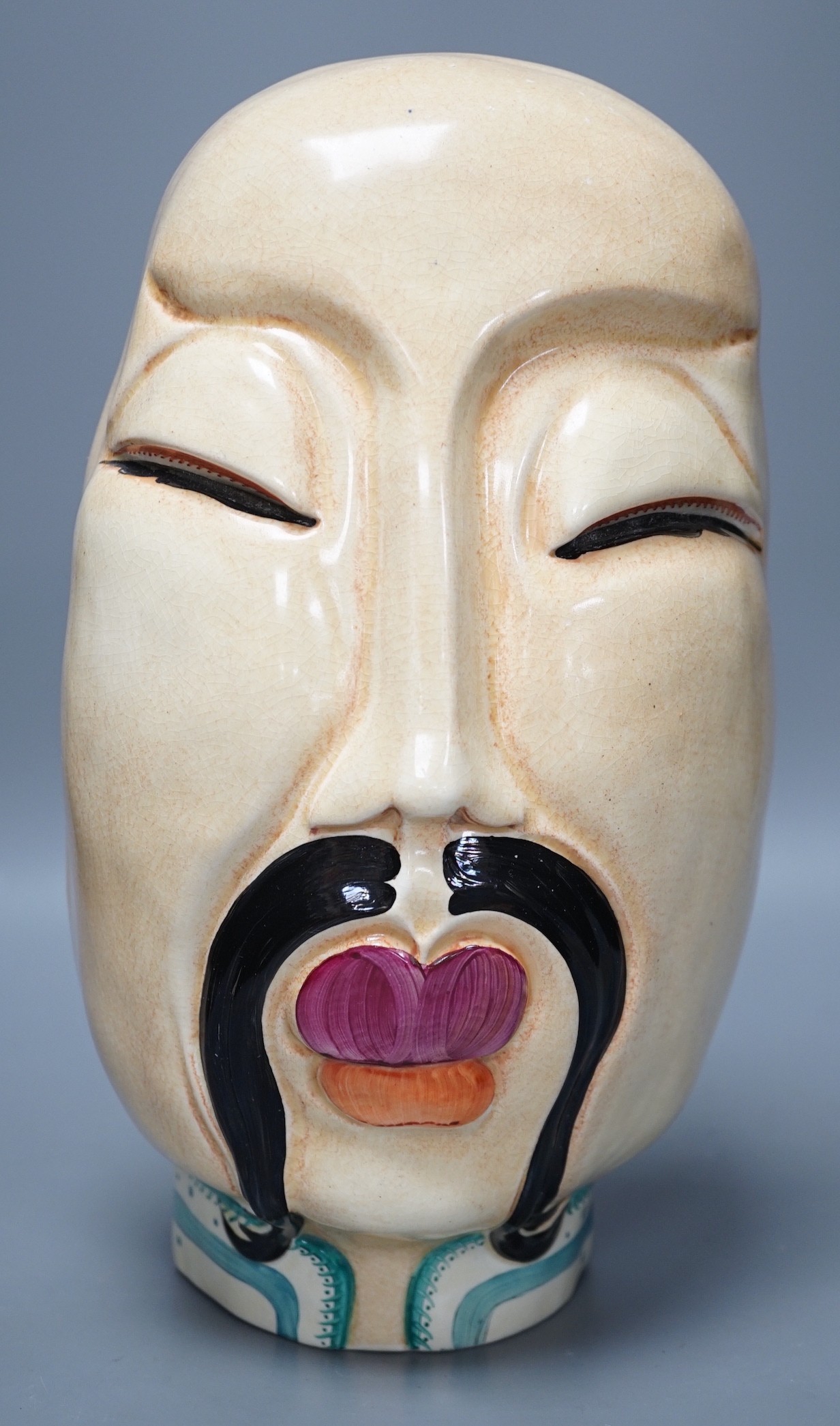 A signed Susie Cooper wall mask of a Chinese gentleman, 30 cms high